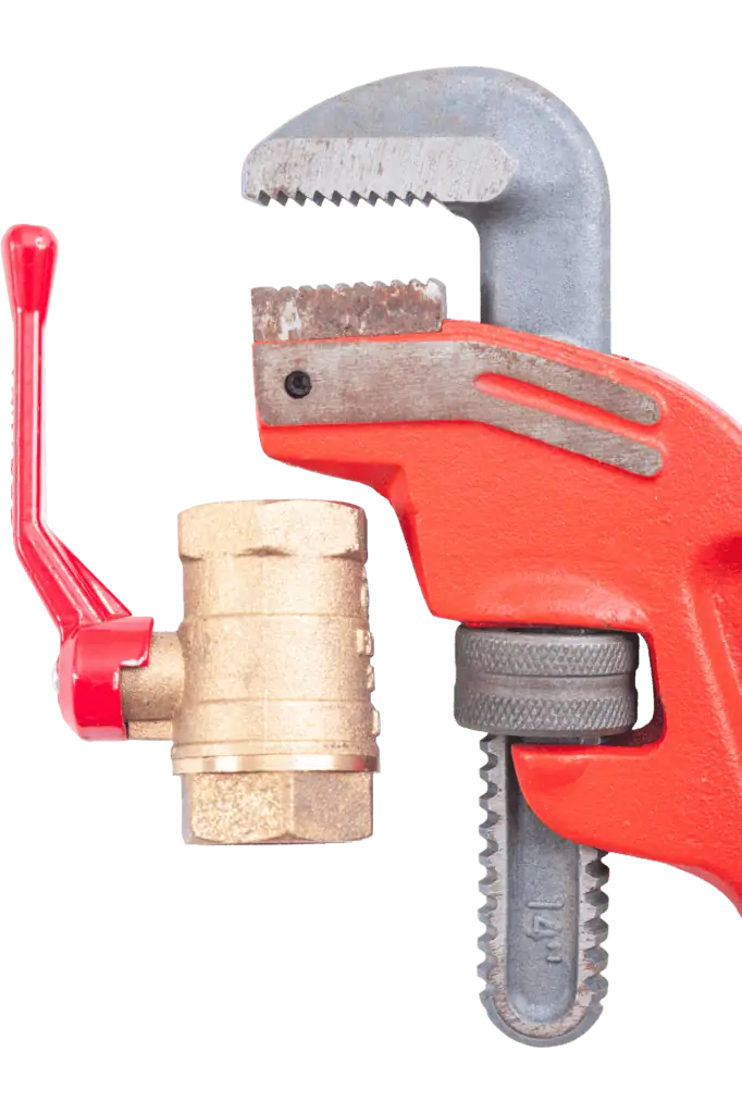 Close-up of plumbing pipe wrench and valve tool for repairs.